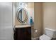 Small bathroom with single vanity and toilet at 32120 N 167Th Ave, Surprise, AZ 85387