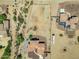 Aerial view of a residential area, showcasing multiple houses and surrounding desert landscape at 32120 N 167Th Ave, Surprise, AZ 85387