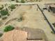 Aerial view of backyard and empty lot at 32120 N 167Th Ave, Surprise, AZ 85387