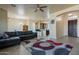 Open living room showcasing a view into the kitchen at 32120 N 167Th Ave, Surprise, AZ 85387