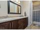 Elegant bathroom with double vanity and granite countertops at 32120 N 167Th Ave, Surprise, AZ 85387