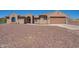 Two-story home with attached garage and desert landscaping at 32120 N 167Th Ave, Surprise, AZ 85387