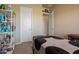 bedroom with twin bed and shelving units at 32120 N 167Th Ave, Surprise, AZ 85387