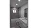 Bathroom with bathtub and modern vanity at 6134 S Borego Rd, Gold Canyon, AZ 85118