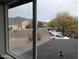Scenic view of neighborhood and mountains from window at 6134 S Borego Rd, Gold Canyon, AZ 85118