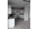 Spacious kitchen with white cabinets and granite countertops at 6134 S Borego Rd, Gold Canyon, AZ 85118