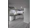 Modern kitchen featuring white cabinets and granite countertops at 6134 S Borego Rd, Gold Canyon, AZ 85118