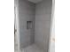 Grey tiled shower with built in niche at 6134 S Borego Rd, Gold Canyon, AZ 85118