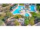 Resort-style pool with water slide, lap lanes, and a spa at 12687 W Caraveo Pl, Peoria, AZ 85383