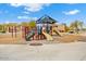 Shaded playground with play structures at 12687 W Caraveo Pl, Peoria, AZ 85383