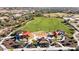 Community playground with play structures at 12687 W Caraveo Pl, Peoria, AZ 85383