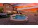 Inviting backyard oasis with a sparkling pool and patio furniture at 12687 W Caraveo Pl, Peoria, AZ 85383