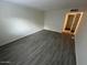 Bedroom with gray wood-look tile flooring at 5132 N 31St Way # 114, Phoenix, AZ 85016