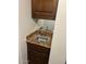 Wet bar with granite countertop and sink at 5132 N 31St Way # 114, Phoenix, AZ 85016