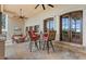 Covered patio with seating area and access to backyard at 10721 E La Junta Rd, Scottsdale, AZ 85255