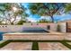 Relaxing spa with stone wall and lush landscaping at 10721 E La Junta Rd, Scottsdale, AZ 85255