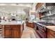 High-end kitchen featuring professional-grade appliances and custom cabinetry at 10721 E La Junta Rd, Scottsdale, AZ 85255