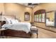 Comfortable bedroom with a king-size bed and plenty of natural light at 10721 E La Junta Rd, Scottsdale, AZ 85255