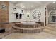 Relaxing bathroom with a freestanding bathtub and a large mirror at 10721 E La Junta Rd, Scottsdale, AZ 85255