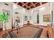 Home office with hardwood floors and coffered ceiling at 10721 E La Junta Rd, Scottsdale, AZ 85255