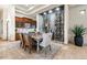 Formal dining room adjacent to a climate controlled wine cellar at 10721 E La Junta Rd, Scottsdale, AZ 85255