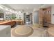 Primary bathroom showcasing a large soaking tub and glass shower at 10721 E La Junta Rd, Scottsdale, AZ 85255
