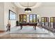 Game room with a pool table and access to a balcony at 10721 E La Junta Rd, Scottsdale, AZ 85255