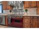 Well-equipped kitchen with a professional range and custom backsplash at 10721 E La Junta Rd, Scottsdale, AZ 85255