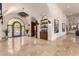 Bright and spacious entry with high ceilings and tile flooring at 10721 E La Junta Rd, Scottsdale, AZ 85255