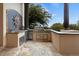 High-end outdoor kitchen with stainless steel appliances at 10721 E La Junta Rd, Scottsdale, AZ 85255
