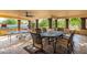 Covered patio with ping pong table and outdoor seating at 10721 E La Junta Rd, Scottsdale, AZ 85255