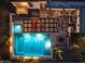 Overhead view of a luxurious pool and patio area at 10721 E La Junta Rd, Scottsdale, AZ 85255