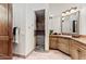 Clean bathroom with a walk-in shower and single vanity at 10721 E La Junta Rd, Scottsdale, AZ 85255