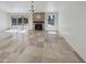 Spacious living area featuring tile flooring and a fireplace at 4801 E Nisbet Rd, Scottsdale, AZ 85254
