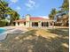 Large backyard with a sparkling pool and covered patio at 4801 E Nisbet Rd, Scottsdale, AZ 85254