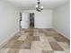 Open dining room with tile floors and access to the kitchen at 4801 E Nisbet Rd, Scottsdale, AZ 85254