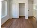 Spacious bedroom with a large closet and wood-look flooring at 4801 E Nisbet Rd, Scottsdale, AZ 85254