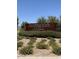 Magma Ranch Vistas community entrance sign with landscaping at 13199 E Larrea Ln, Florence, AZ 85132