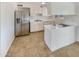 Bright kitchen features stainless steel appliances and ample counter space at 5750 W Cortez St, Glendale, AZ 85304