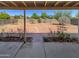 Backyard with covered patio and gravel landscaping at 5750 W Cortez St, Glendale, AZ 85304