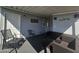 Covered patio with seating area and access to the home at 8700 E University Dr # 339, Mesa, AZ 85207