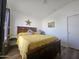 Bright bedroom with wood flooring and a large window at 8700 E University Dr # 339, Mesa, AZ 85207