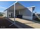 Mobile home with covered patio and parking at 8700 E University Dr # 339, Mesa, AZ 85207