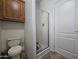Bathroom featuring a walk-in shower and wood cabinet at 8700 E University Dr # 339, Mesa, AZ 85207