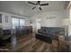 Open living room with wood floors and seating area at 8700 E University Dr # 339, Mesa, AZ 85207