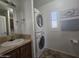 Clean bathroom with a stacked washer and dryer at 8700 E University Dr # 339, Mesa, AZ 85207