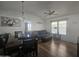 Spacious living room with hardwood floors and a ceiling fan at 8700 E University Dr # 339, Mesa, AZ 85207