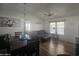Living room with dining area, sofa, and ceiling fan at 8700 E University Dr # 339, Mesa, AZ 85207