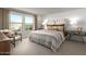 Large main bedroom with neutral tones and ample natural light at 5910 S 246Th Ln, Buckeye, AZ 85326