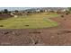 Community park with grassy areas and walking paths at 5420 S 253Rd Ln, Buckeye, AZ 85326